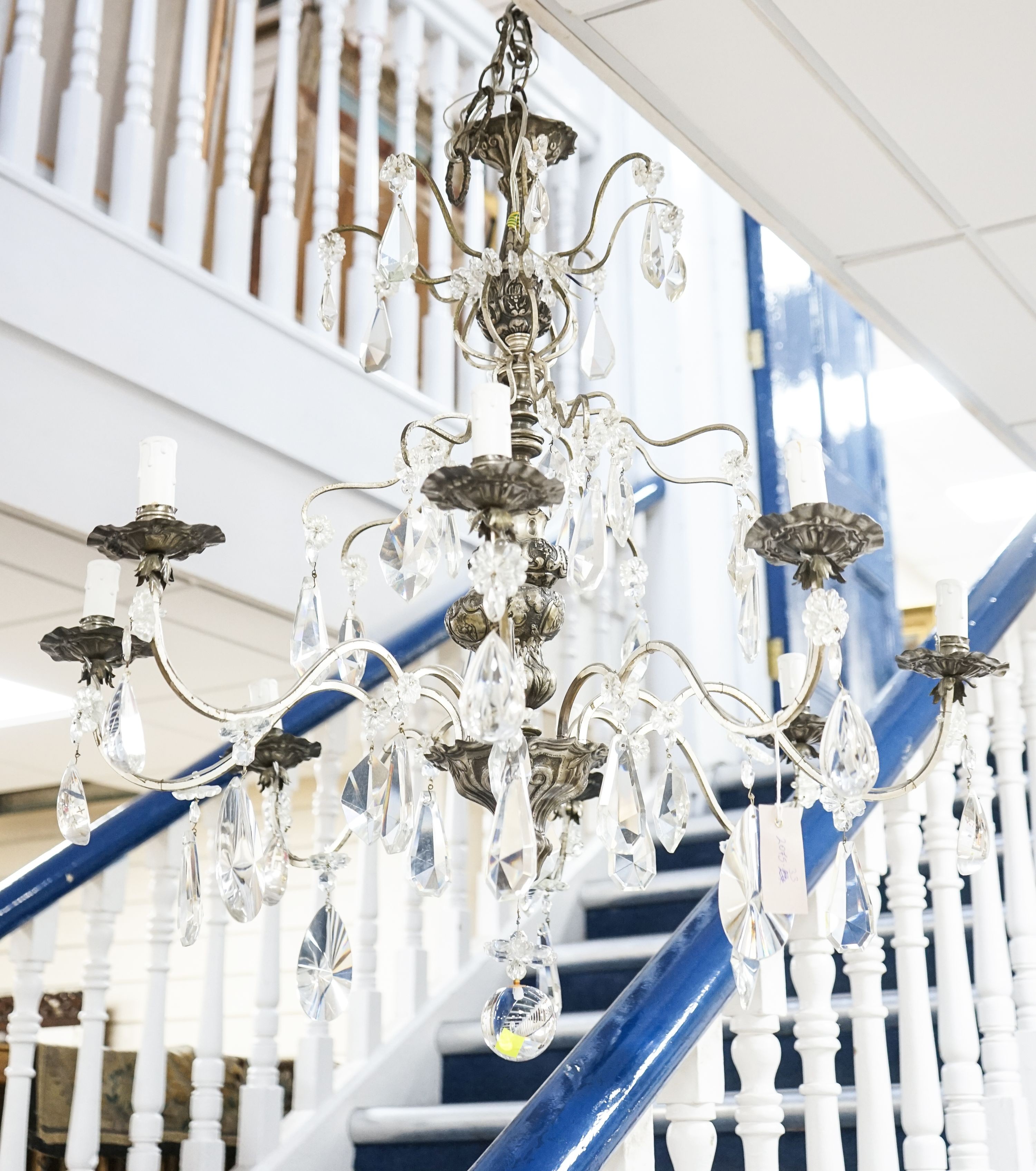 A silvered and crystal eight branch chandelier, approx. height 79cm
